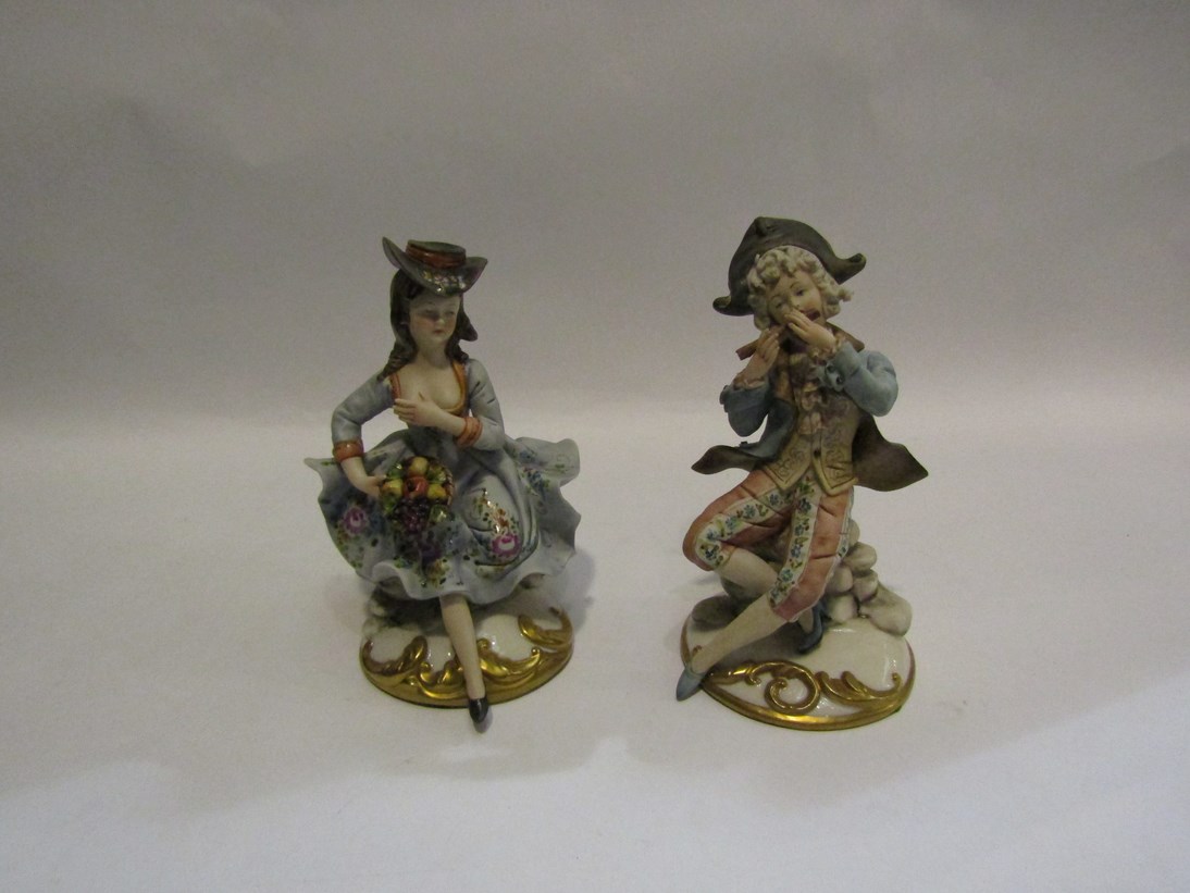 A pair of Capodimonte figures
