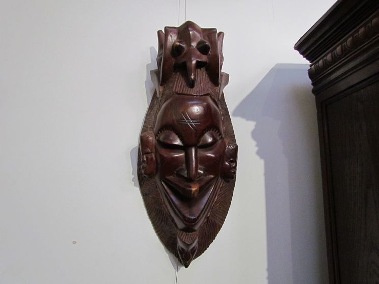 A carved African mask,
