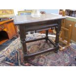 A pair of pegged oak joined stools with chip carved seat over fretwork friezes on turned legs