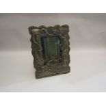 A 19th Century Chinese white metal photo frame with dragon design