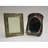 Two small silver photograph frames