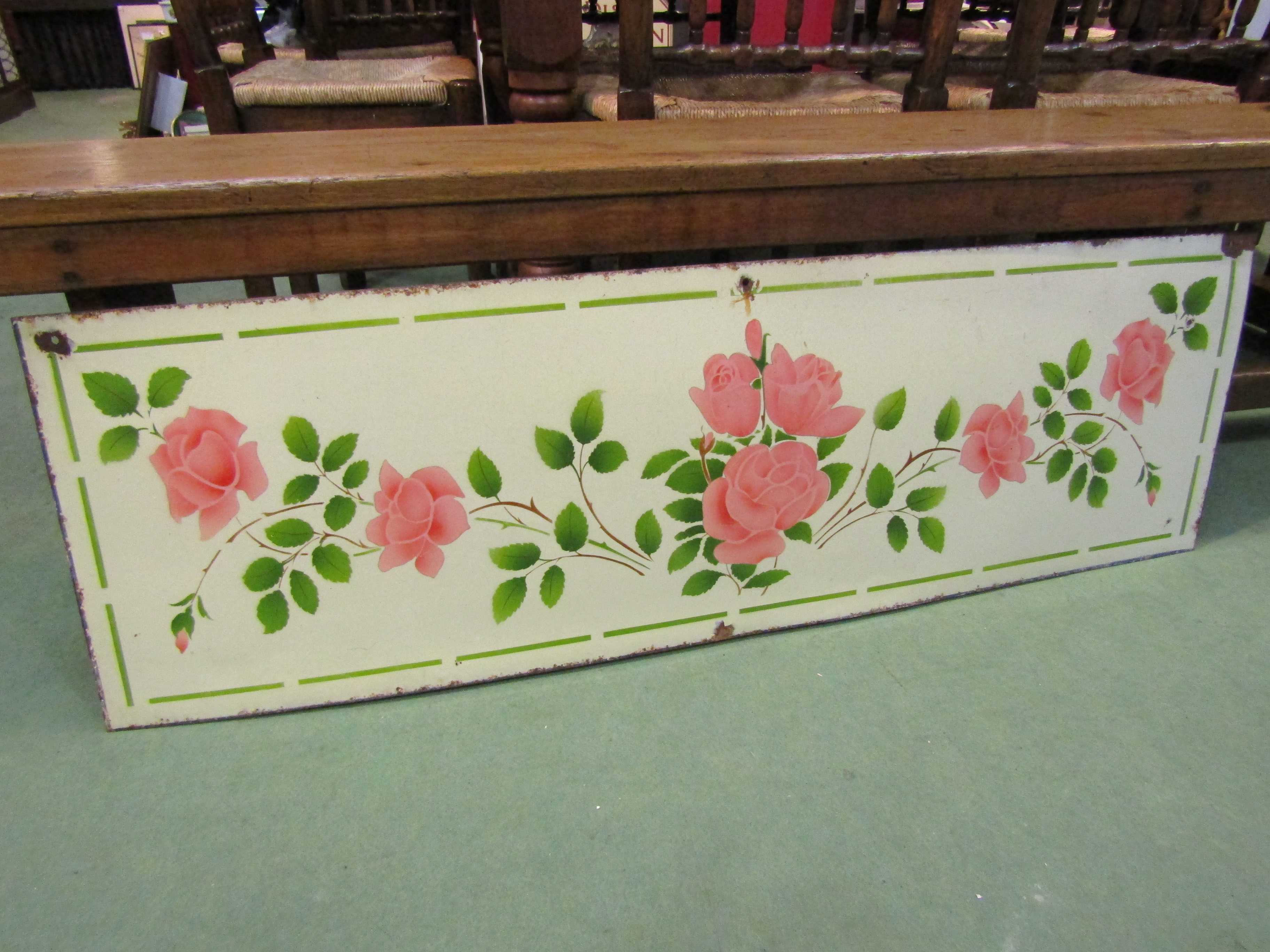 An enamelled rose pattern washboard back,