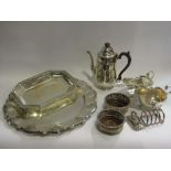 A quantity of silver plate including coffee pot, flatware, entree dish, sauce boats,