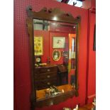 A bevel edged mahogany mirror,