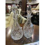 Two cut glass decanters with stoppers