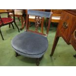 A Victorian nursing chair with blue velour upholstery, swag splat back,