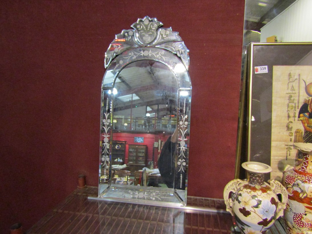 A modern Venetian style mirror with floral spray decoration,