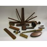 A box of mixed treen including folding book stand, ring sizer,