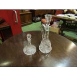 A cut glass claret jug and cut glass liqueur decanter