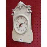 A wooden distressed style wall clock,