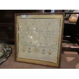 A framed and glazed Victorian sampler,