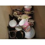A collection of teacups and saucers,