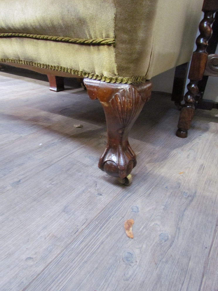 A George IV wingback armchair with ball and claw feet on castors, - Image 2 of 2