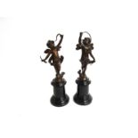 Two cast bronze cherub figures on plinths a/f,