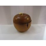 A 19th Century fruitwood apple form tea caddy, 12.5cm tall approx.