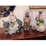 Three 20th Century Oriental figures,