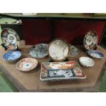 Mixed Oriental dishes and saucers,