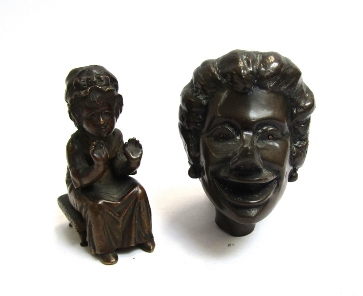 A cast bronze figure small child and bust of female approx 7.