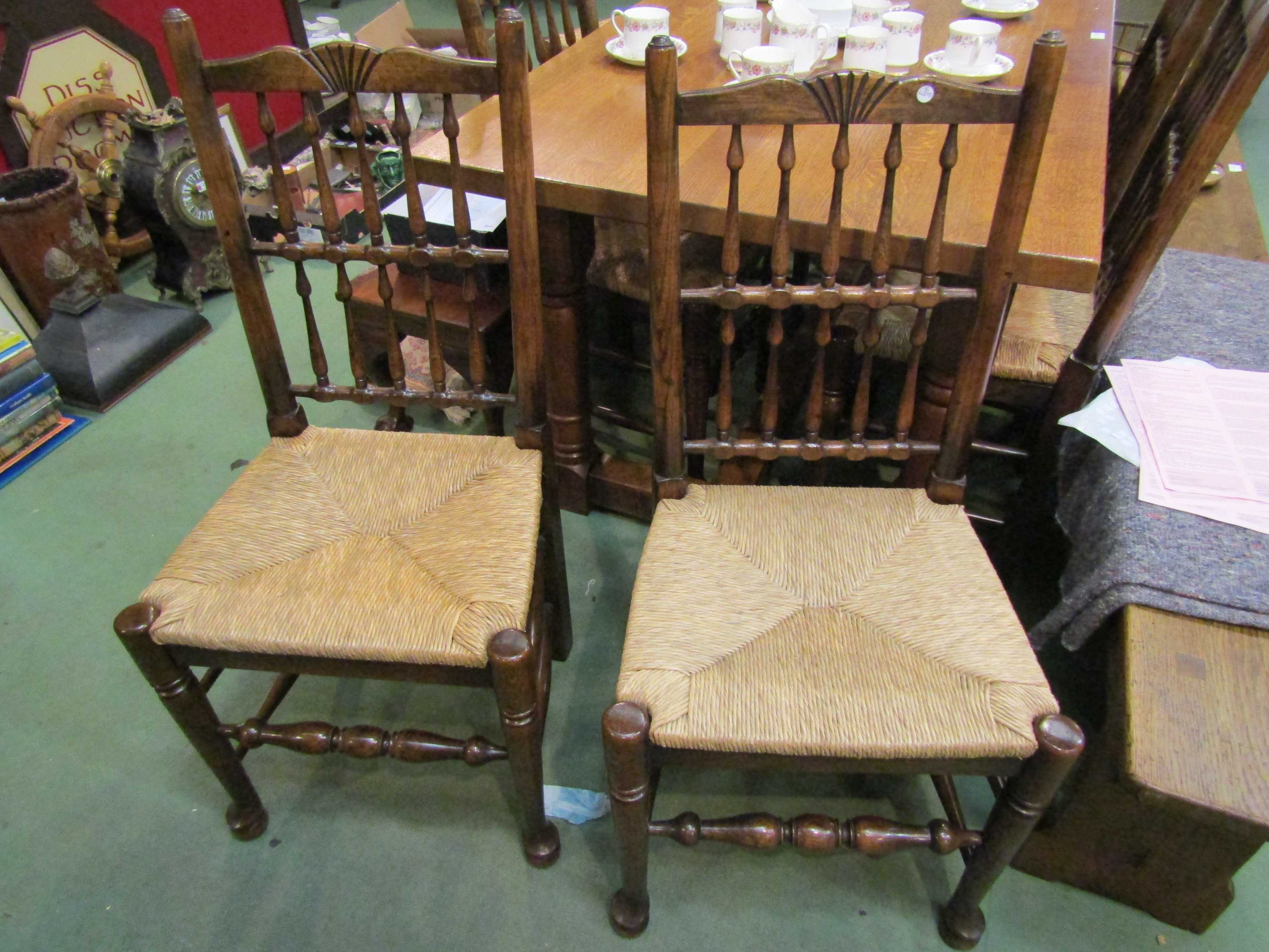 A set of eight (6+2) oak spindle back and rush seated dining chairs - Image 2 of 3