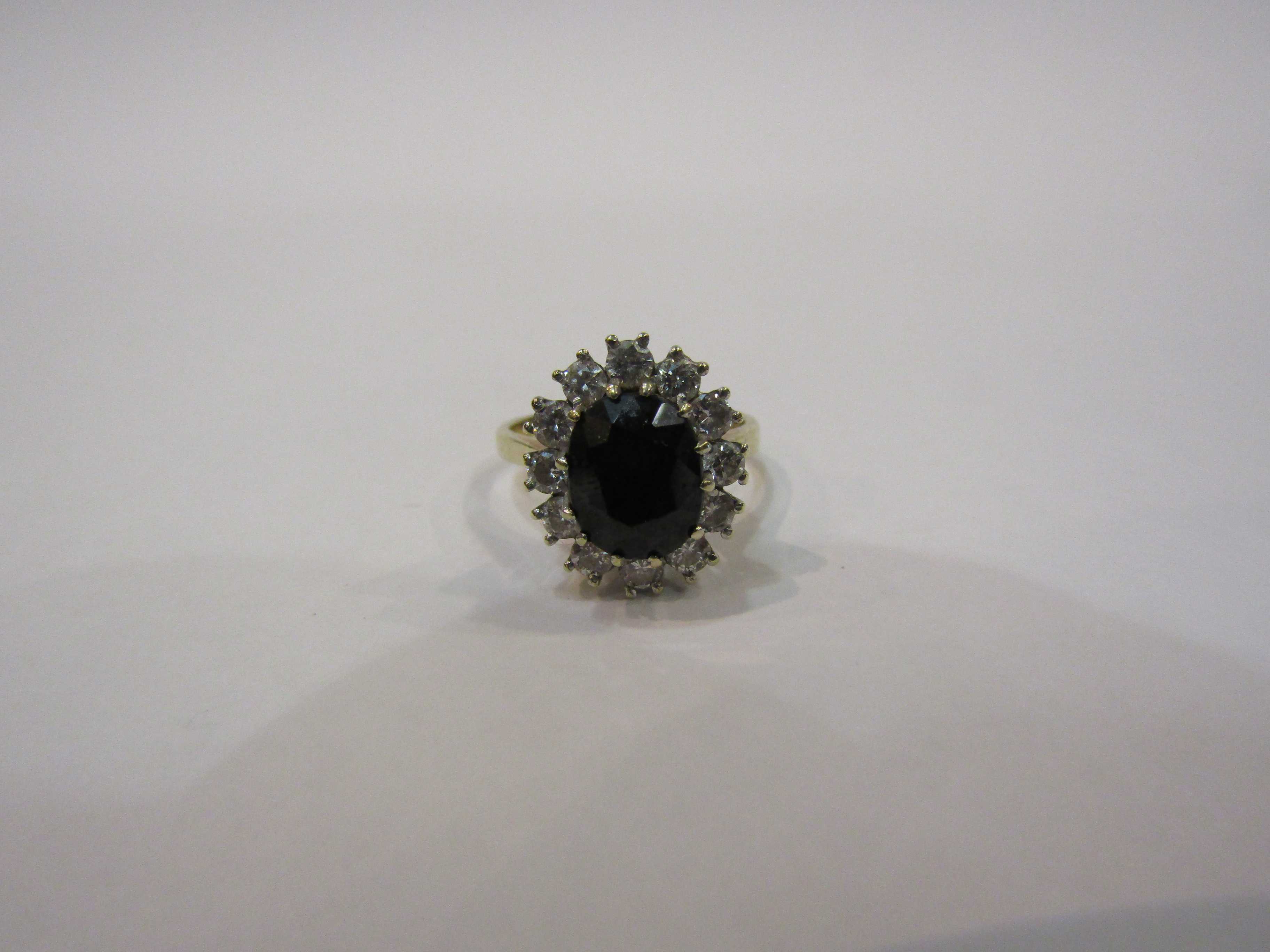 A 9ct sapphire and diamond cluster ring - Image 2 of 4
