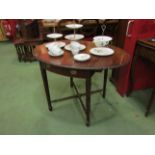 An Edwardian Pembroke table with carved border/edge, square tapering legs, filled cracks to top,