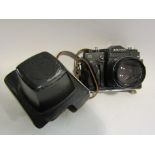 A vintage Russian 35mm camera, Zenith II with leather case,