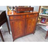 A 19th Century flame mahogany chiffonier base the two frieze drawers over two door cupboard with