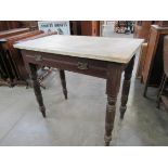 A Victorian pine side table with single drawer