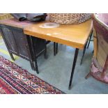 Two teak square top pub tables on metal legs