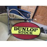 A wrought iron double sided shop front sign,