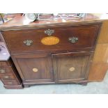 An Irish George III inlaid mahogany secretaire cabinet