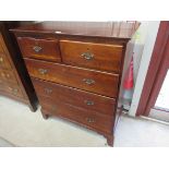 A Georgian polished walnut chest of two over three drawers on bracket feet, new handles,