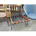 A mid 20th Century teak and metal framed easy chair