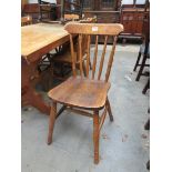 A mixed set of seven pine kitchen chairs