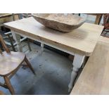 A pine top kitchen table on painted leg base 114 x 73cm