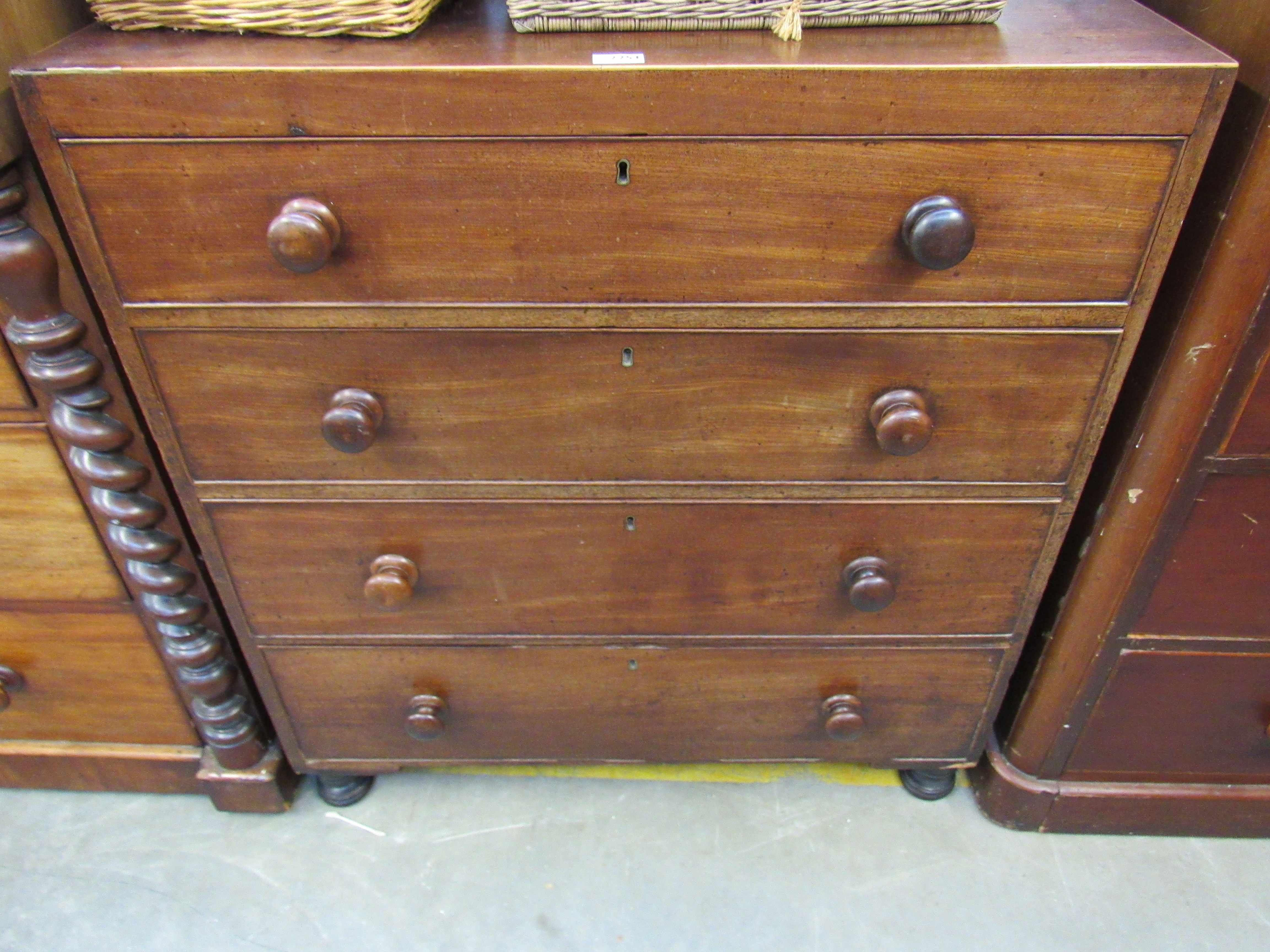 A Georgian mahogany chest of four drawers