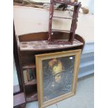 A bookcase with mixed books,