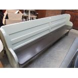 A painted pine pew with removable cushion seat,