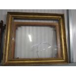 A 19th Century gilt and gesso picture frame with glass and mount,