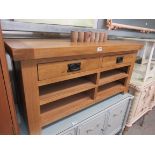 A light oak two drawer T.