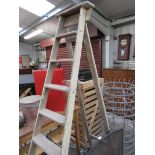 A 1940's part painted pine eight rung decorators folding step ladder