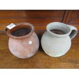 Two small terracotta jugs