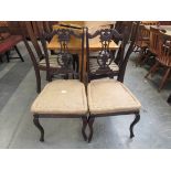 A pair of late 19th Century mahogany dining chairs,