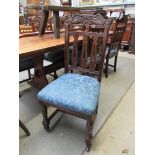 Six late Victorian mahogany dining chairs with dolphin carved backs