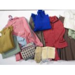 A box containing mainly 1940's and 1950's ladies clothing including knitwear, skirts, pajamas,