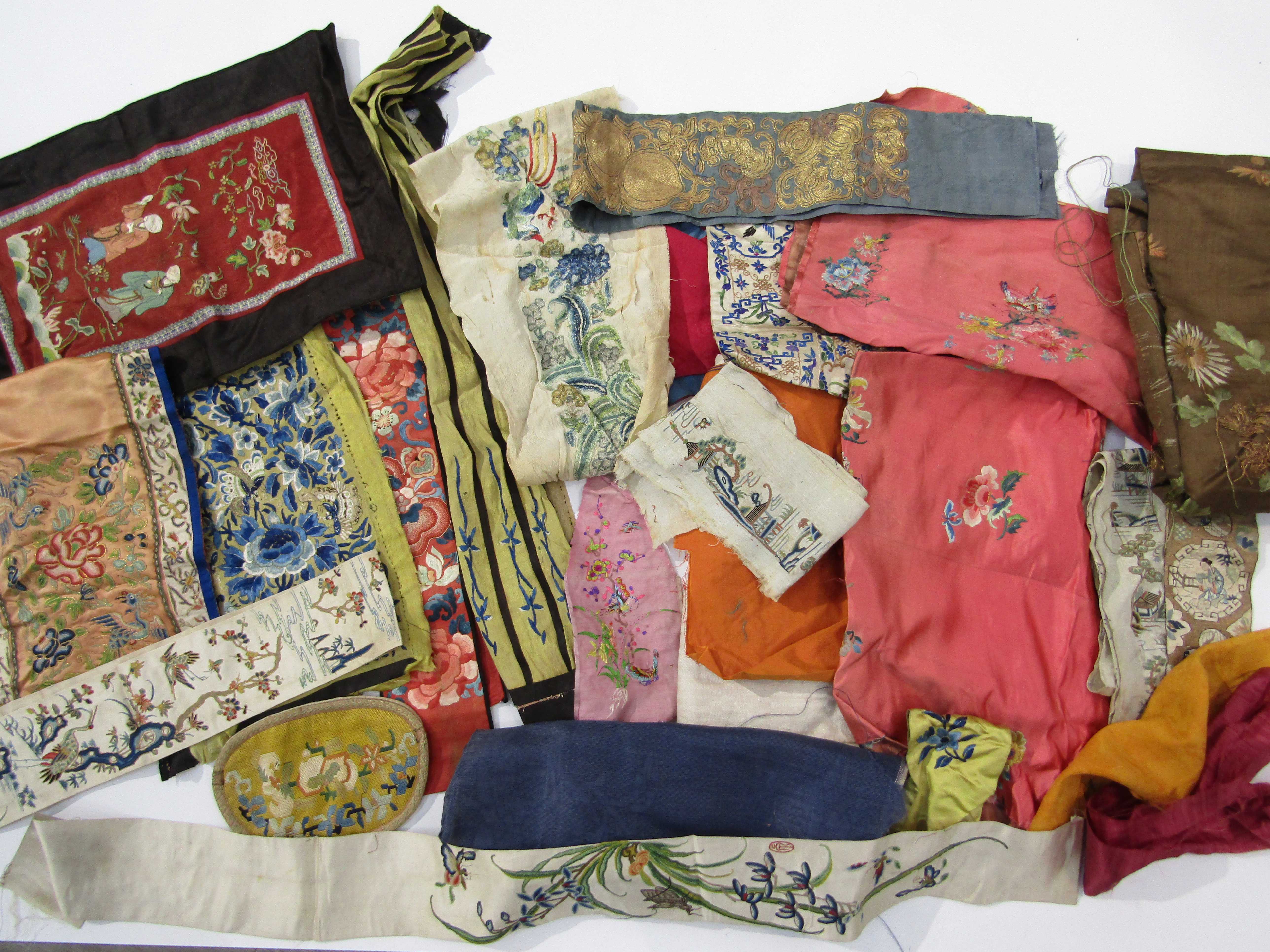 A small quantity of mainly Chinese silk embroideries, possibly late 19th/early 20th Century.