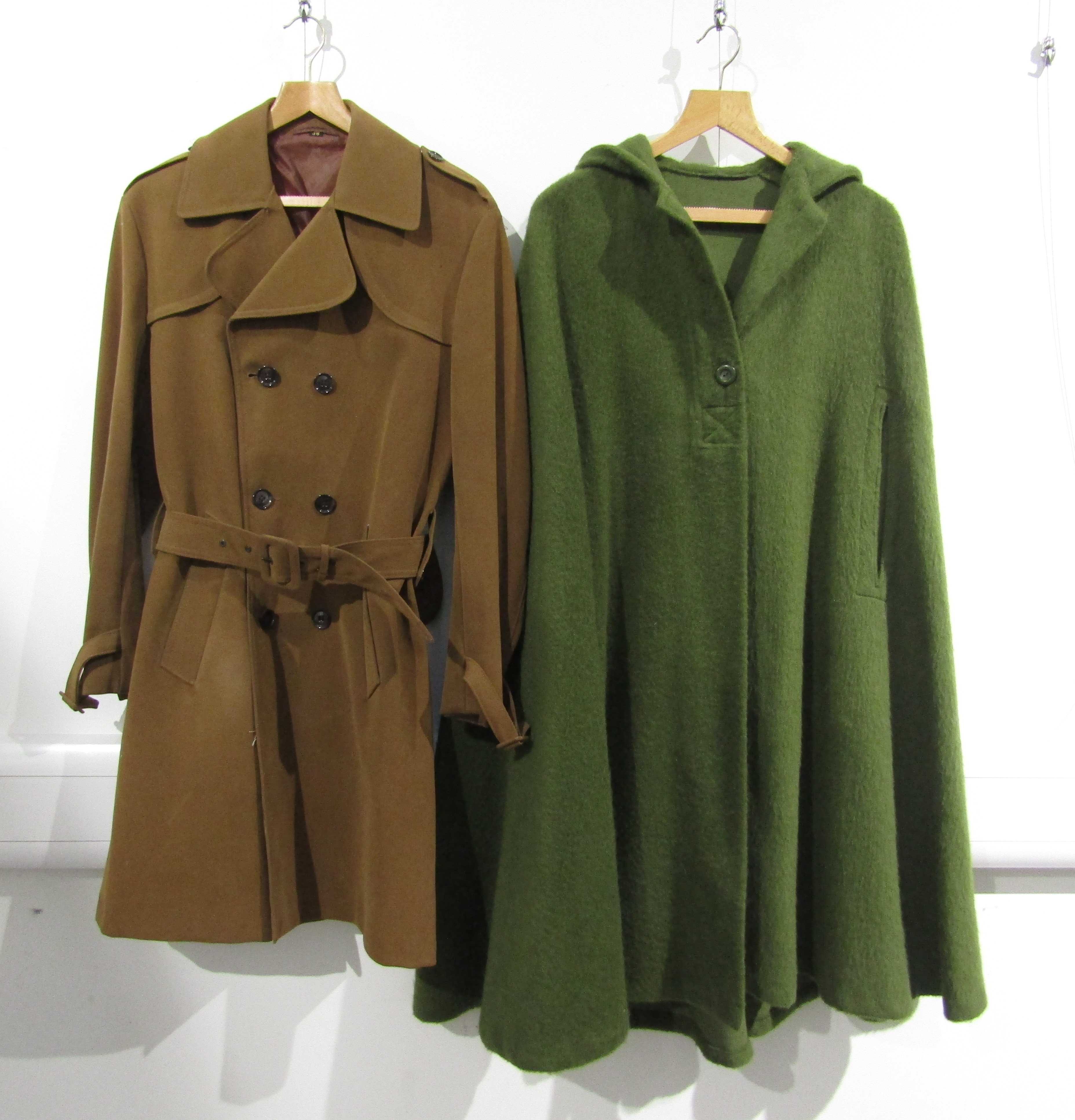 A pea green wool cape with hood and a 1960's faux tan suede gents car coat.