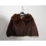 A vintage chestnut mink jacket