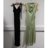 A 1930's full length apple green evening dress, with pale peach trim to the sleeve, cut on the bias,