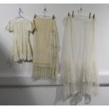 A cream Victorian lace under skirt measuring 107cm waist to hem.